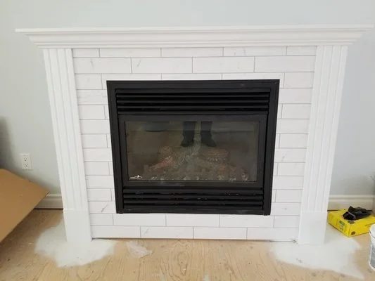 Fireplace surround with white tile